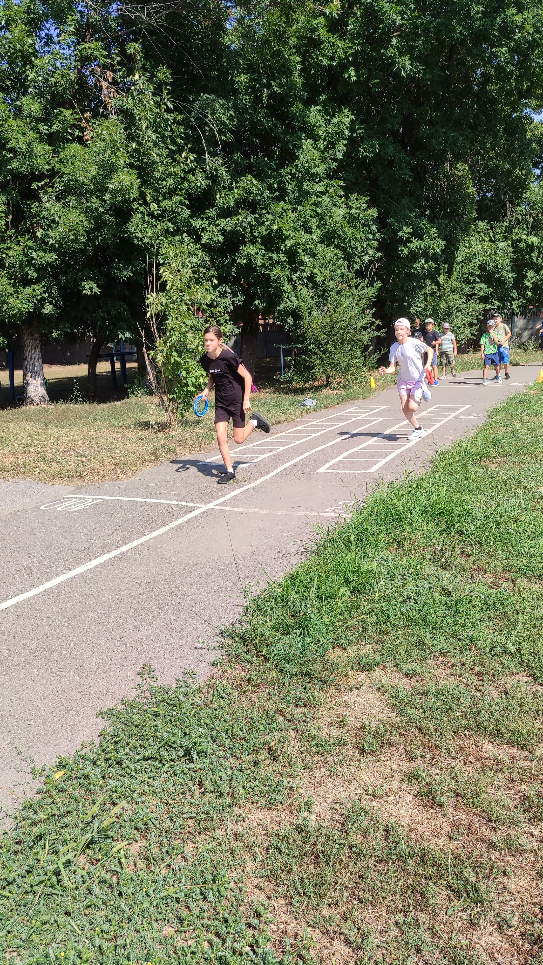 Спорттық жүгіру жарысы. Спортивные соревнования по бегу.